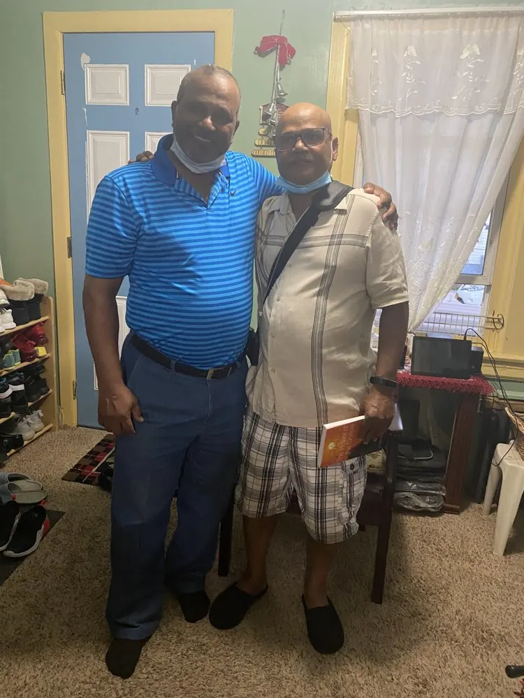 Kris Persaud with a friend